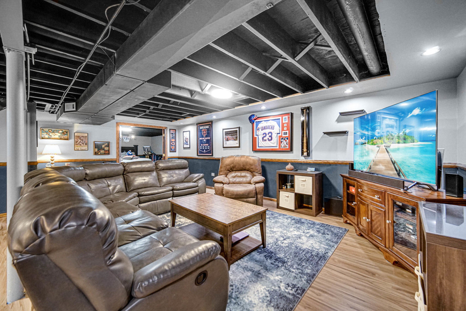 2425 Suffolk Lane Joliet, IL 60433 - Photo 17 of 24 a living room with furniture and a flat screen tv