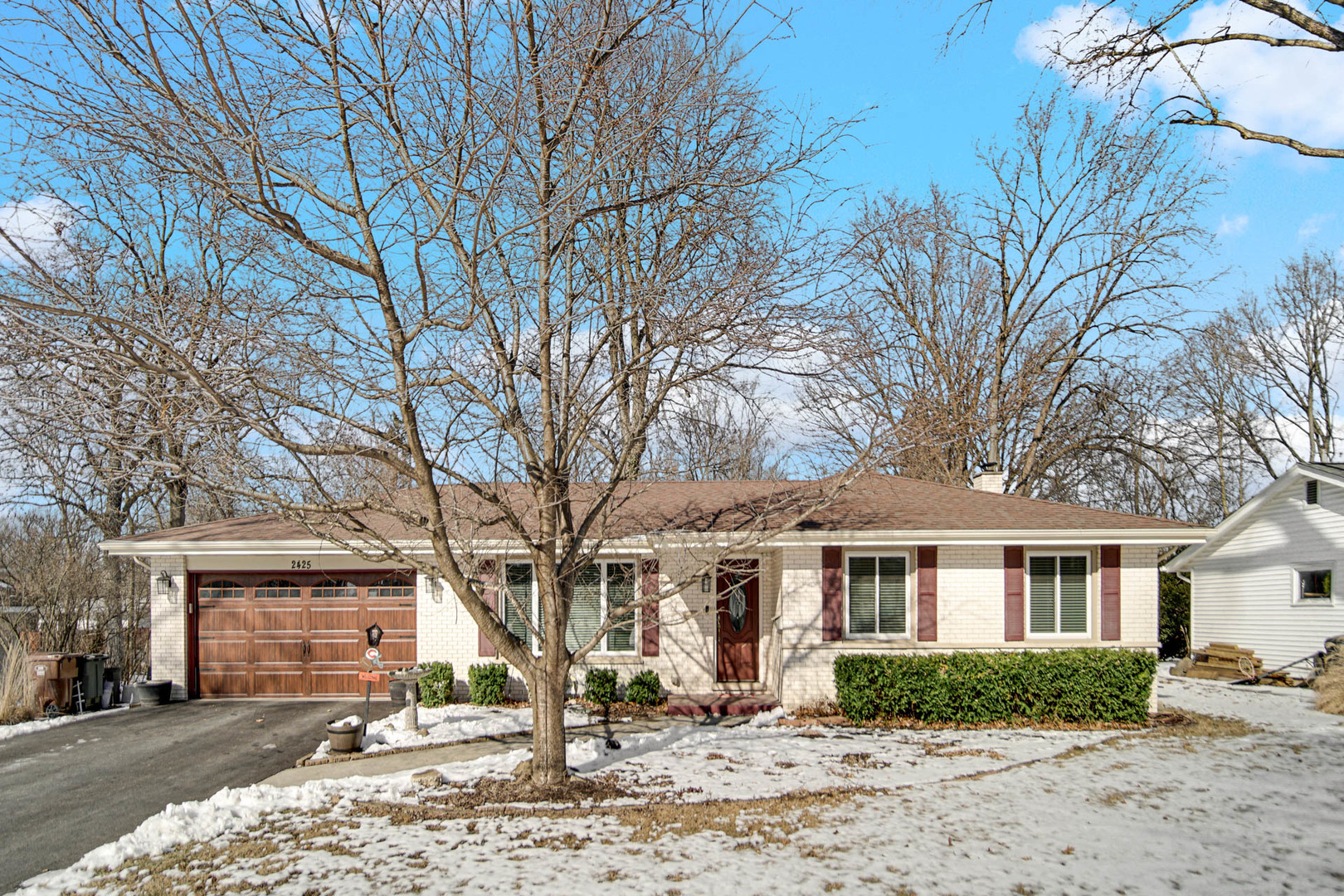 2425 Suffolk Lane Joliet, IL 60433 - Photo 2 of 24 a front view of a house with a yard