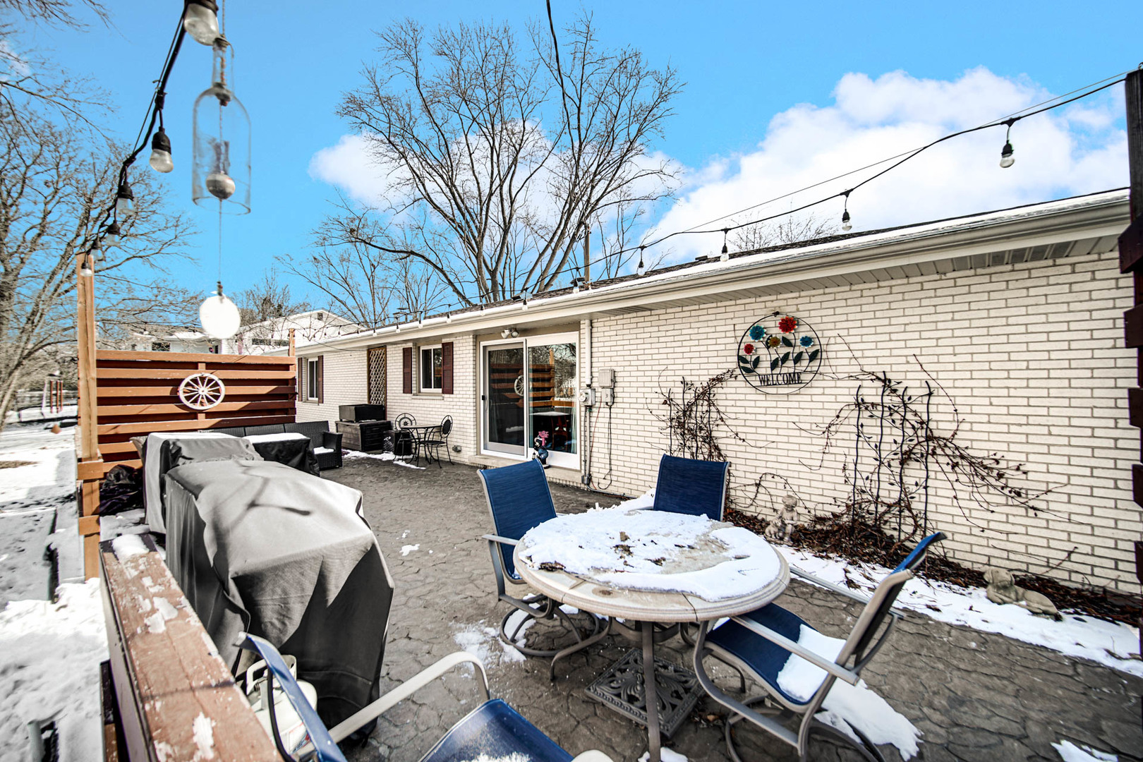 2425 Suffolk Lane Joliet, IL 60433 - Photo 21 of 24 a view of a patio with table and chairs and potted plants