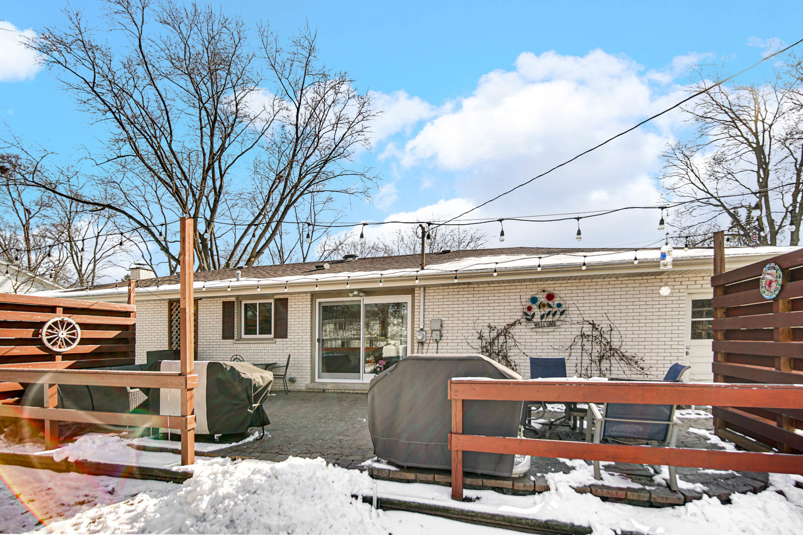 2425 Suffolk Lane Joliet, IL 60433 - Photo 24 of 24 a view of a patio with a table and chairs