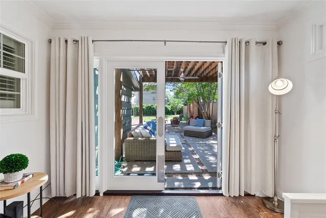 a room with furniture and a large window