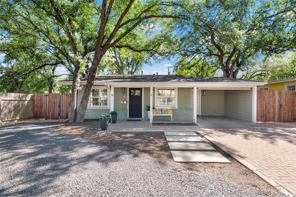 2105 Westover Road Austin, TX 78703 - Photo 3 of 19 a front view of a house with a garden and yard