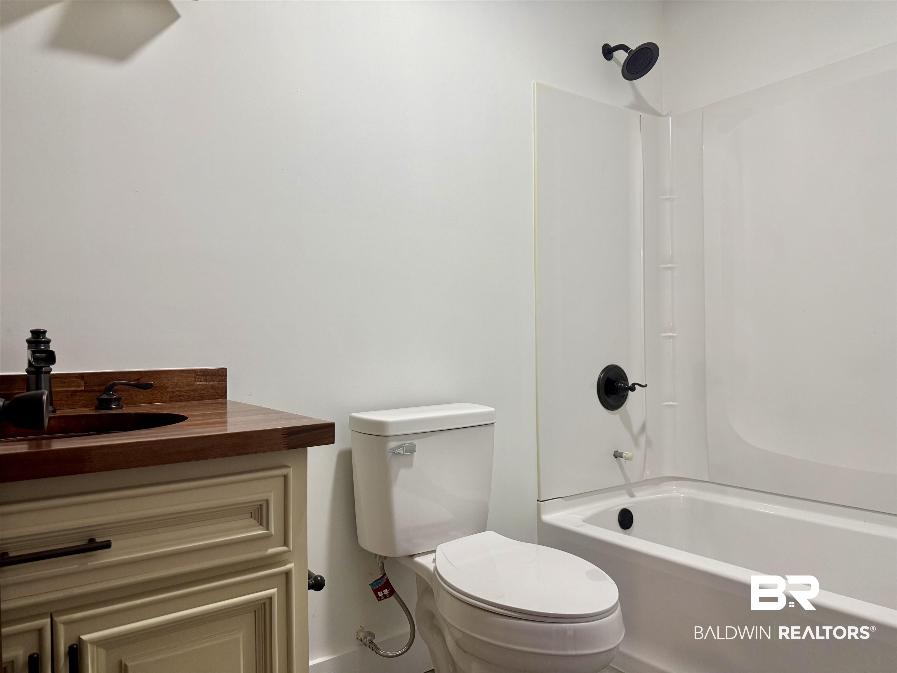 613 Forrest Avenue Brewton, AL 36426 - Photo 20 of 22 Bathroom featuring vanity and shower / bathtub combination