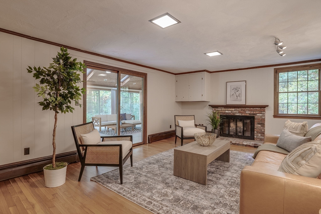 16 Fox Run Road Bedford, MA 01730 - Photo 16 of 37 a living room with furniture and a fireplace