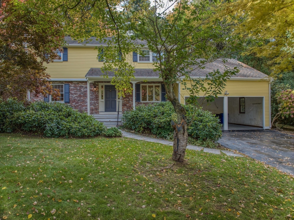 16 Fox Run Road Bedford, MA 01730 - Photo 29 of 37 front view of a house with a yard