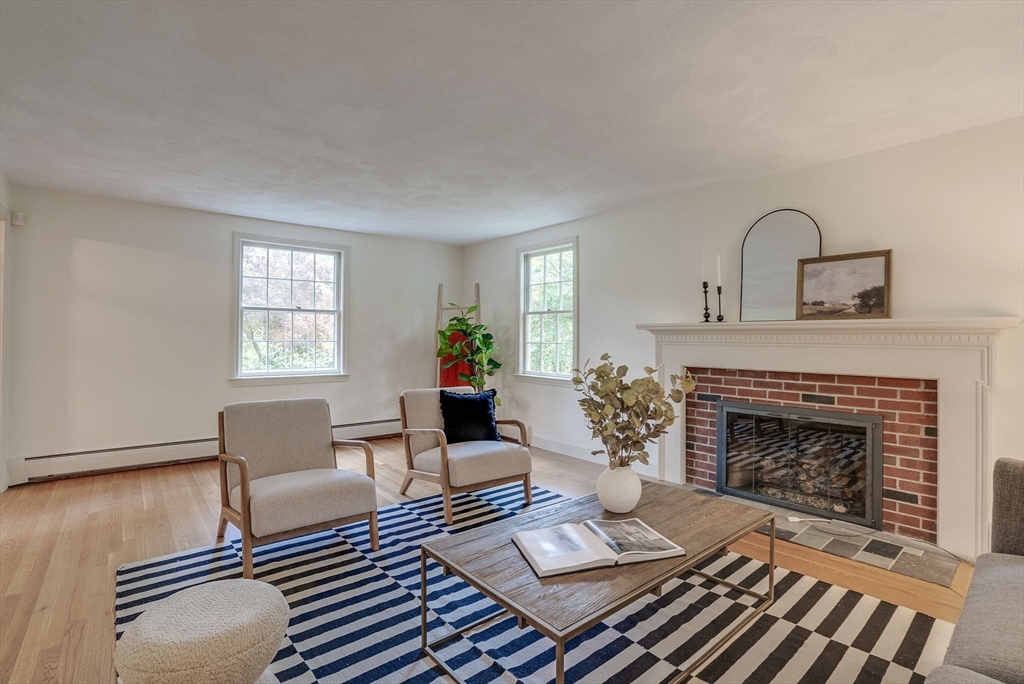 16 Fox Run Road Bedford, MA 01730 - Photo 3 of 37 a living room with furniture and a fireplace