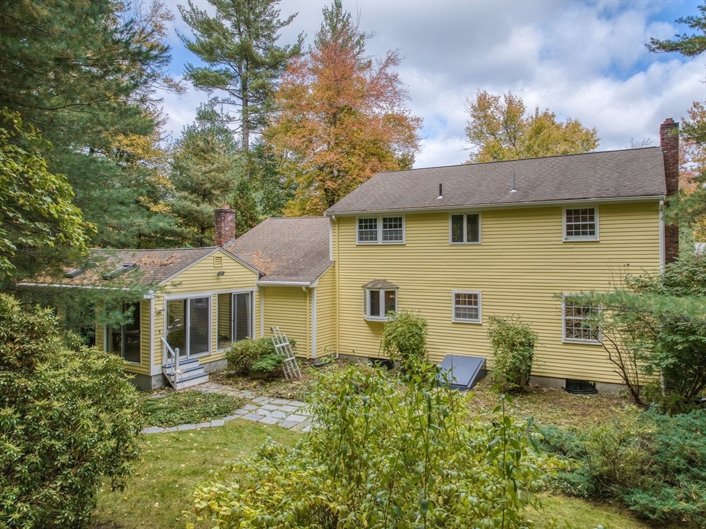 16 Fox Run Road Bedford, MA 01730 - Photo 34 of 37 a front view of a house with a yard