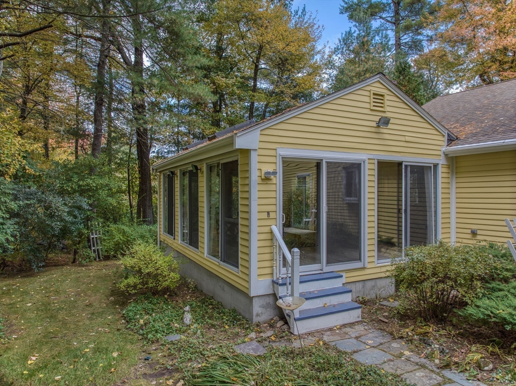 16 Fox Run Road Bedford, MA 01730 - Photo 35 of 37 a front view of a house with a yard