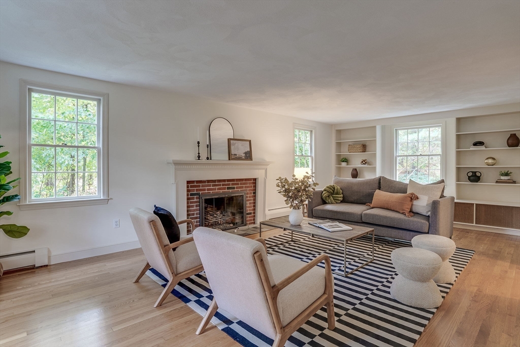 16 Fox Run Road Bedford, MA 01730 - Photo 4 of 37 a living room with furniture and a fireplace