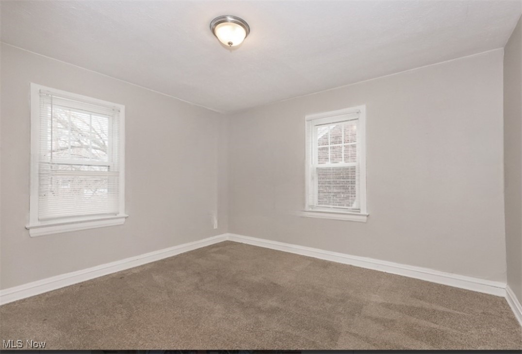 3649 Cummings Road Cleveland, OH 44118 - Photo 6 of 11 View of carpeted empty room