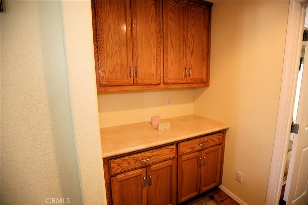 171 Bridgegate Lane Paso Robles, CA 93446 - Photo 15 of 37 a kitchen with a sink and cabinets