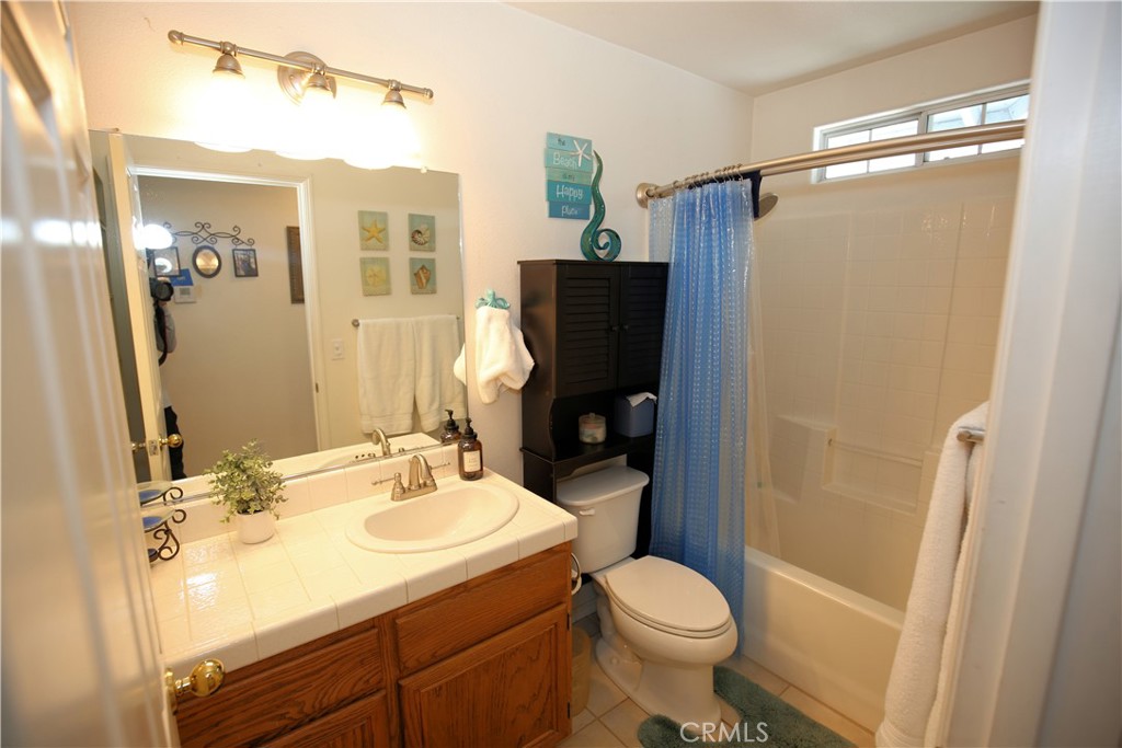 171 Bridgegate Lane Paso Robles, CA 93446 - Photo 16 of 37 a bathroom with a sink toilet and shower