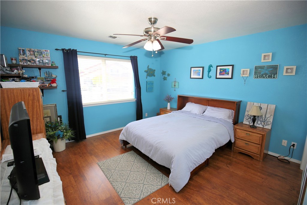171 Bridgegate Lane Paso Robles, CA 93446 - Photo 17 of 37 a bedroom with a bed dresser and a window