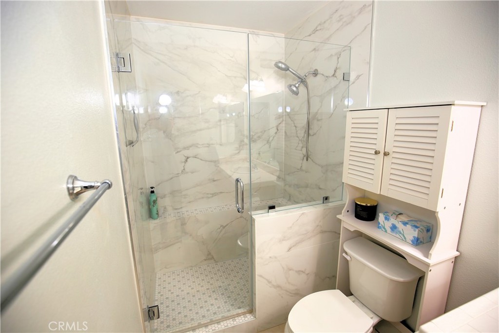 171 Bridgegate Lane Paso Robles, CA 93446 - Photo 18 of 37 a bathroom with a toilet and a shower