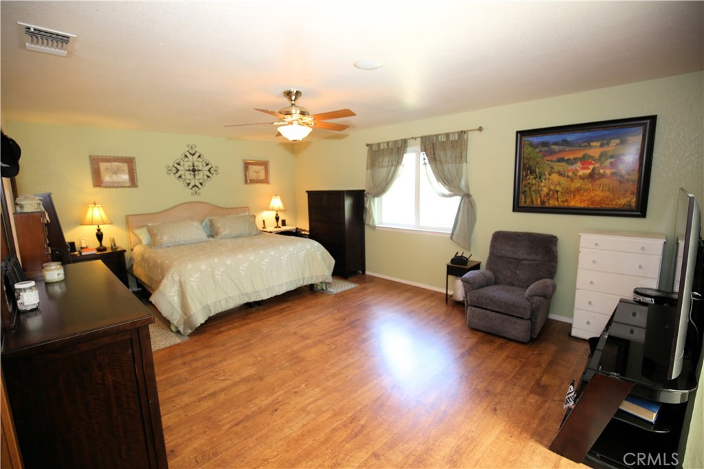 171 Bridgegate Lane Paso Robles, CA 93446 - Photo 22 of 37 a bedroom with furniture and a window