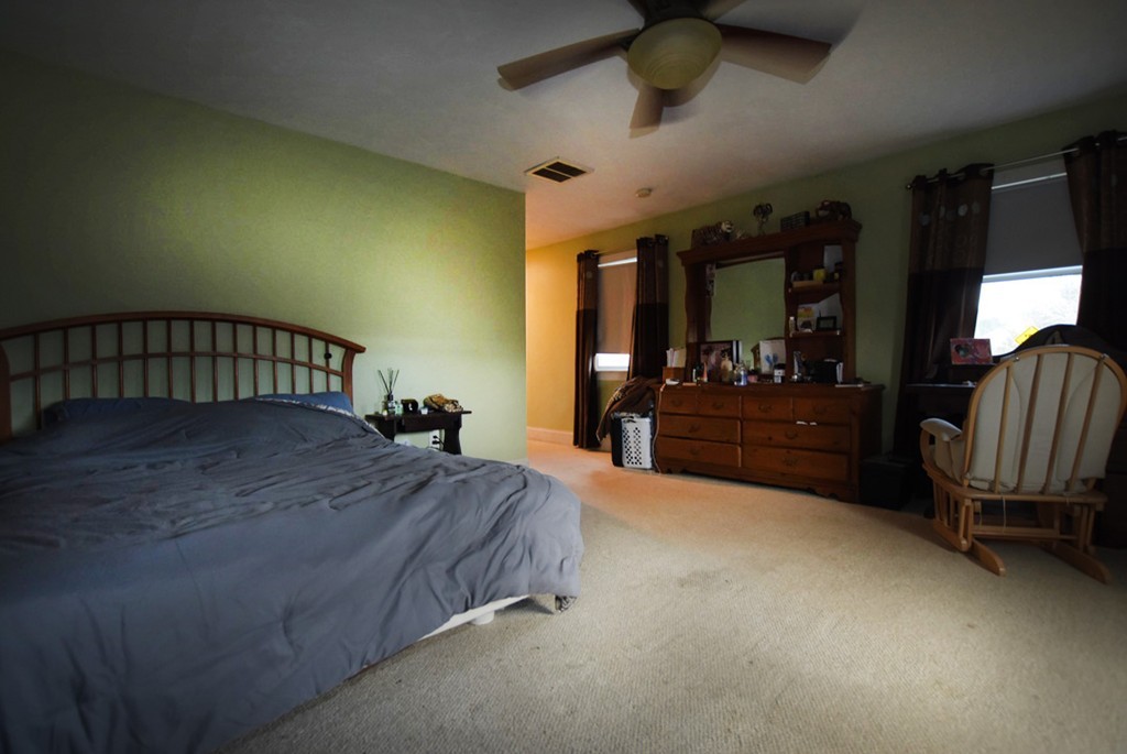 16 Shaw Road Fairhaven, MA 02719 - Photo 11 of 14 a bedroom with a bed and furniture