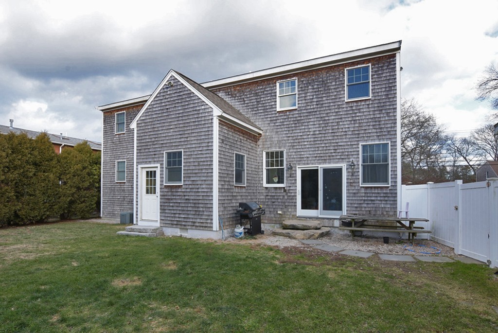 16 Shaw Road Fairhaven, MA 02719 - Photo 14 of 14 a front view of a house with a yard