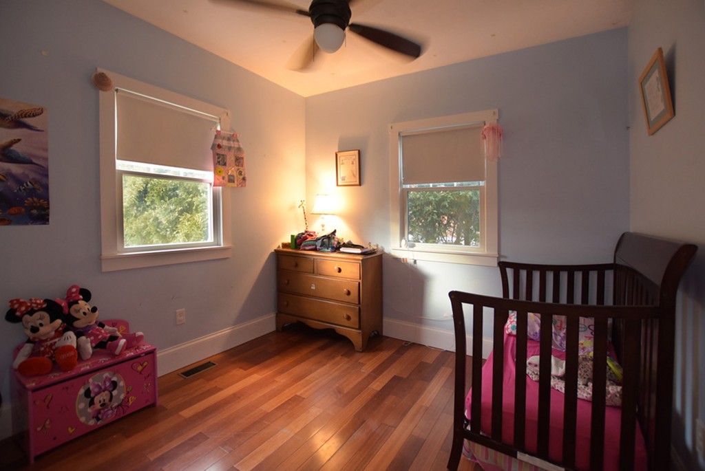 16 Shaw Road Fairhaven, MA 02719 - Photo 7 of 14 a bedroom with furniture and a window