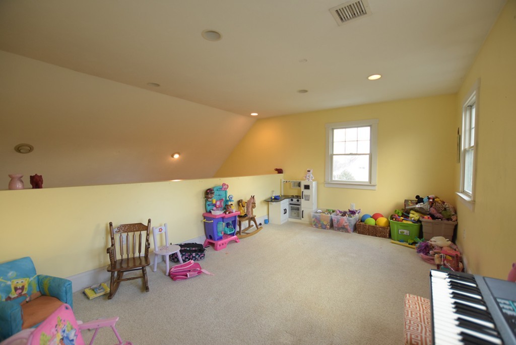16 Shaw Road Fairhaven, MA 02719 - Photo 10 of 14 a bedroom with furniture and a window