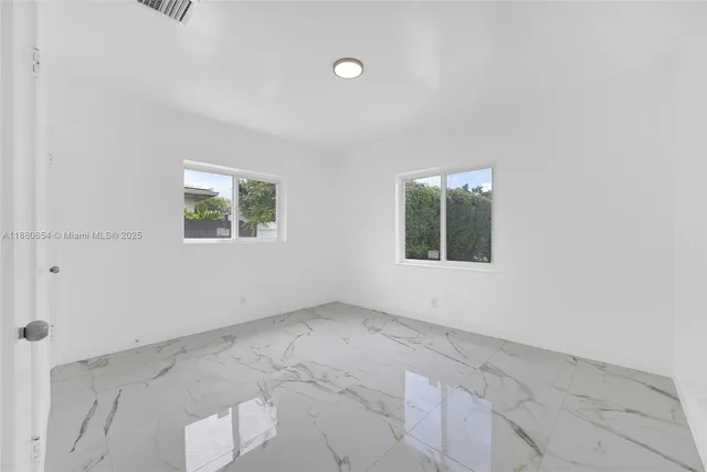 $1,595,000 | 11011 Northeast 9th Court, Biscayne Park, FL 33161