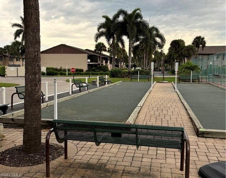4180 Looking Glass Lane, Unit 4104 Naples, FL 34112 - Photo 16 of 30 a view of outdoor space yard and patio