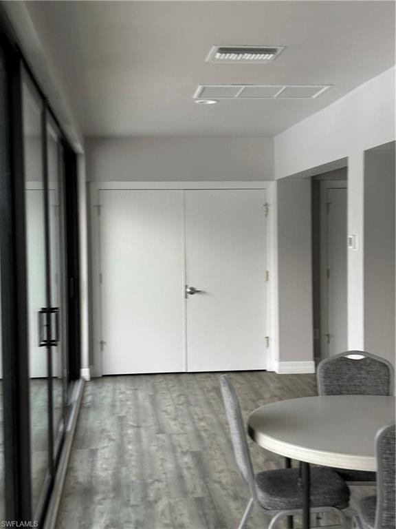 4180 Looking Glass Lane, Unit 4104 Naples, FL 34112 - Photo 26 of 30 a living room with furniture and a table