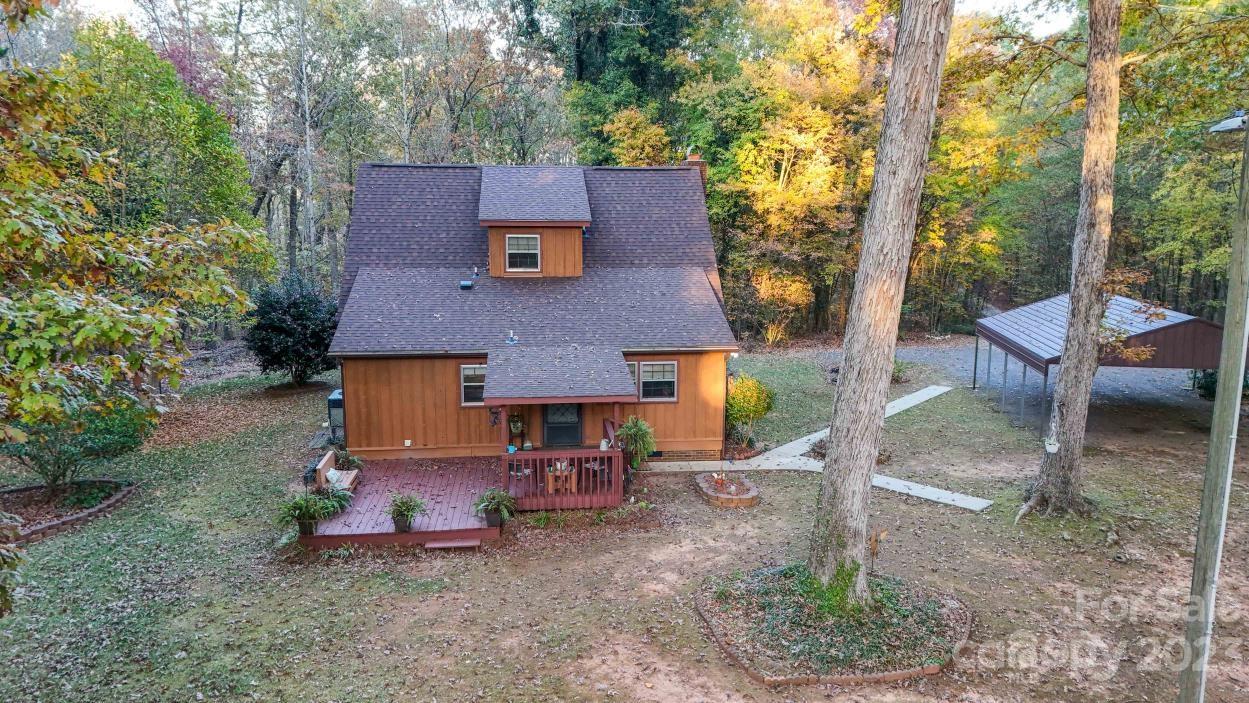 1765 Carnes Wilson Road Lancaster, SC 29720 - Photo 4 of 40 an aerial view of a house with garden space and sitting area
