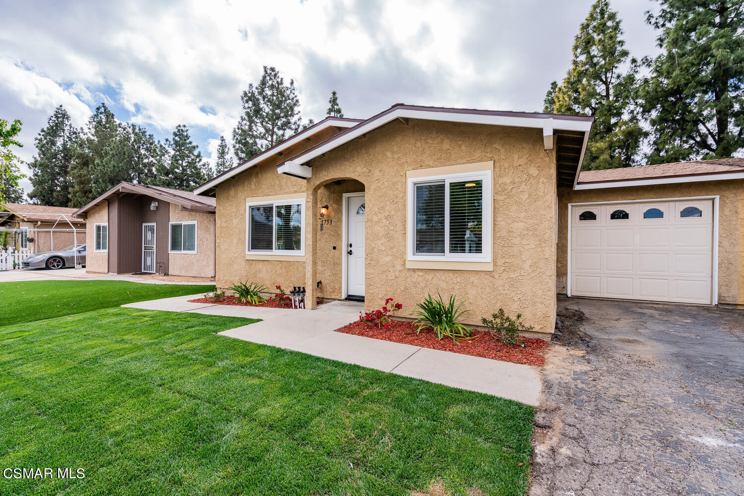 1753 Moreno Drive Simi Valley, CA 93063 - Photo 1 of 19 a view of an house with backyard space and garden