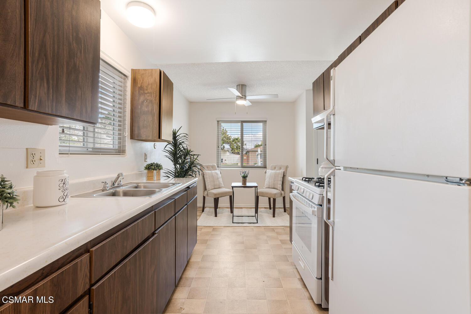 1753 Moreno Drive Simi Valley, CA 93063 - Photo 11 of 19 a kitchen with sink cabinets and window