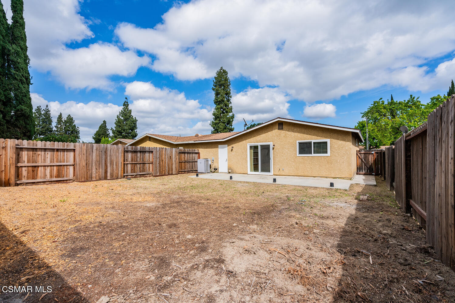 1753 Moreno Drive Simi Valley, CA 93063 - Photo 18 of 19 a view of a house with wooden fence