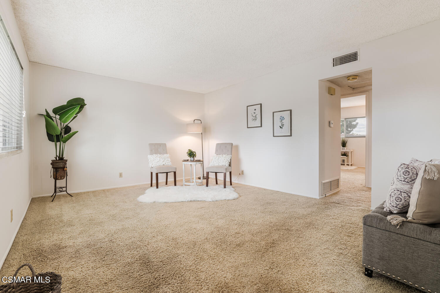 1753 Moreno Drive Simi Valley, CA 93063 - Photo 3 of 19 a view of livingroom with furniture and a potted plant