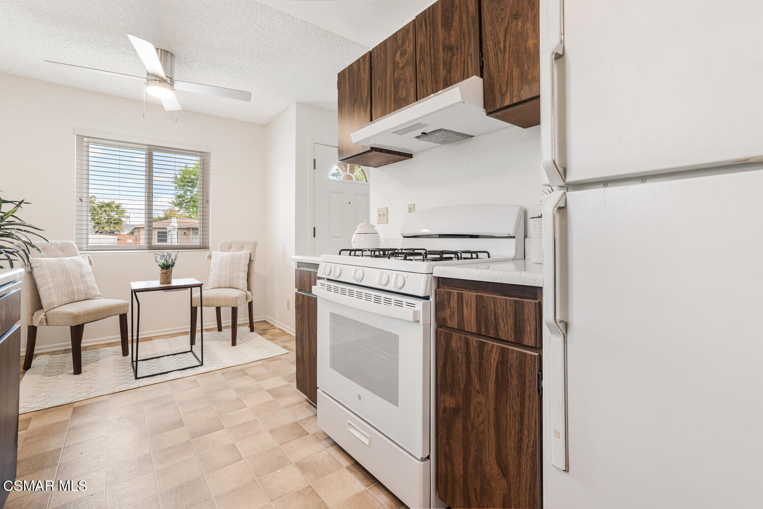 1753 Moreno Drive Simi Valley, CA 93063 - Photo 10 of 19 a kitchen with stainless steel appliances granite countertop a stove and a refrigerator
