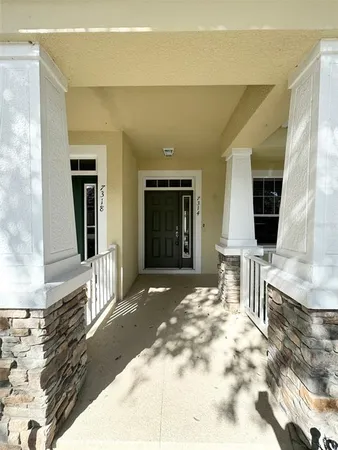 a view of a house with a porch