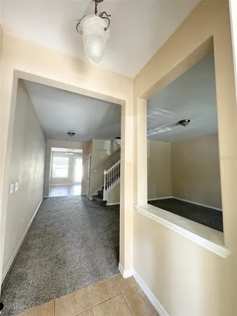 a view of a hallway with entryway