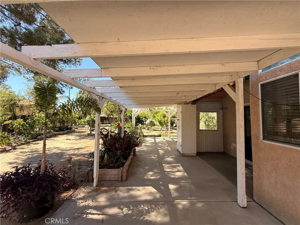a view of a porch with furniture