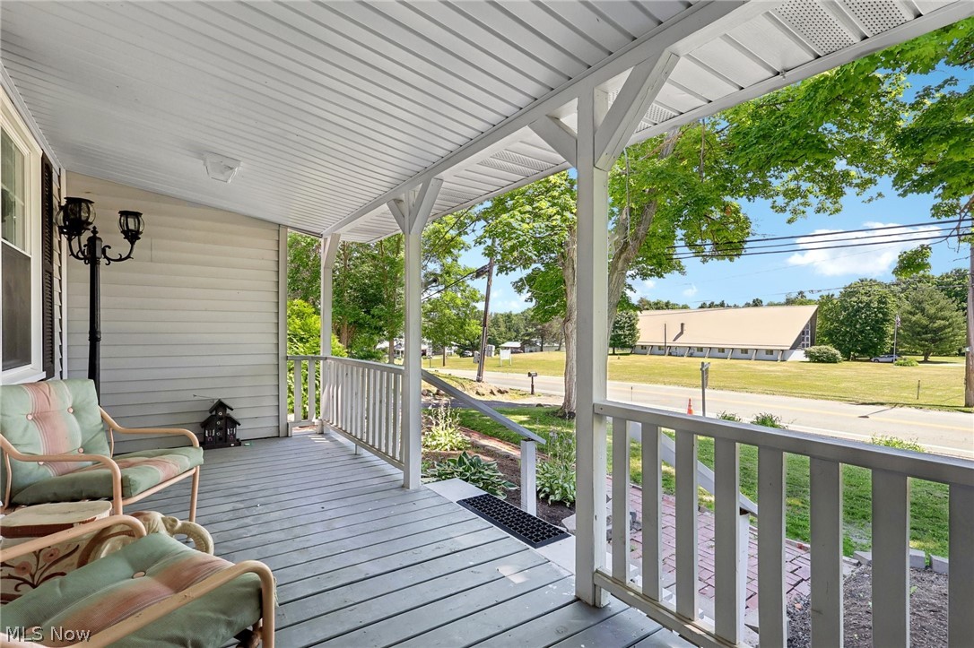 16146 Ravenna Road Burton, OH 44021 - Photo 4 of 27 Deck featuring a lawn