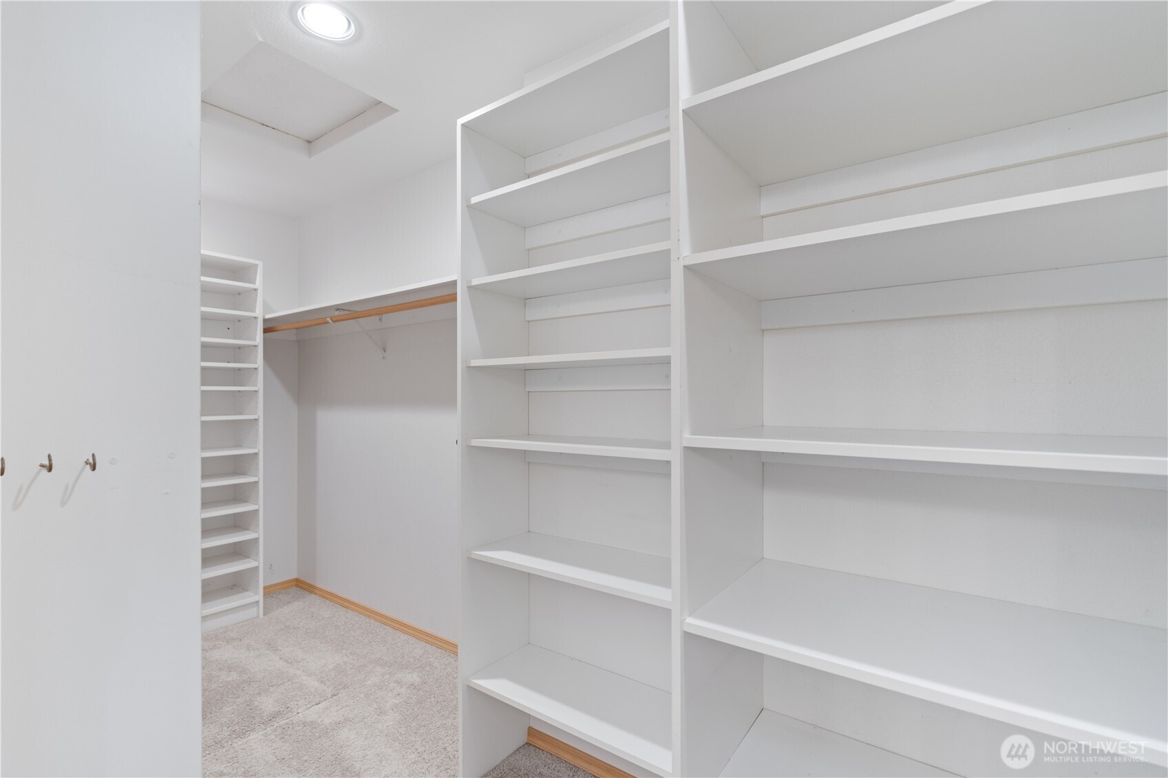 292 Foursome Drive Sequim, WA 98382 - Photo 21 of 32 a view of walk in closet with empty racks