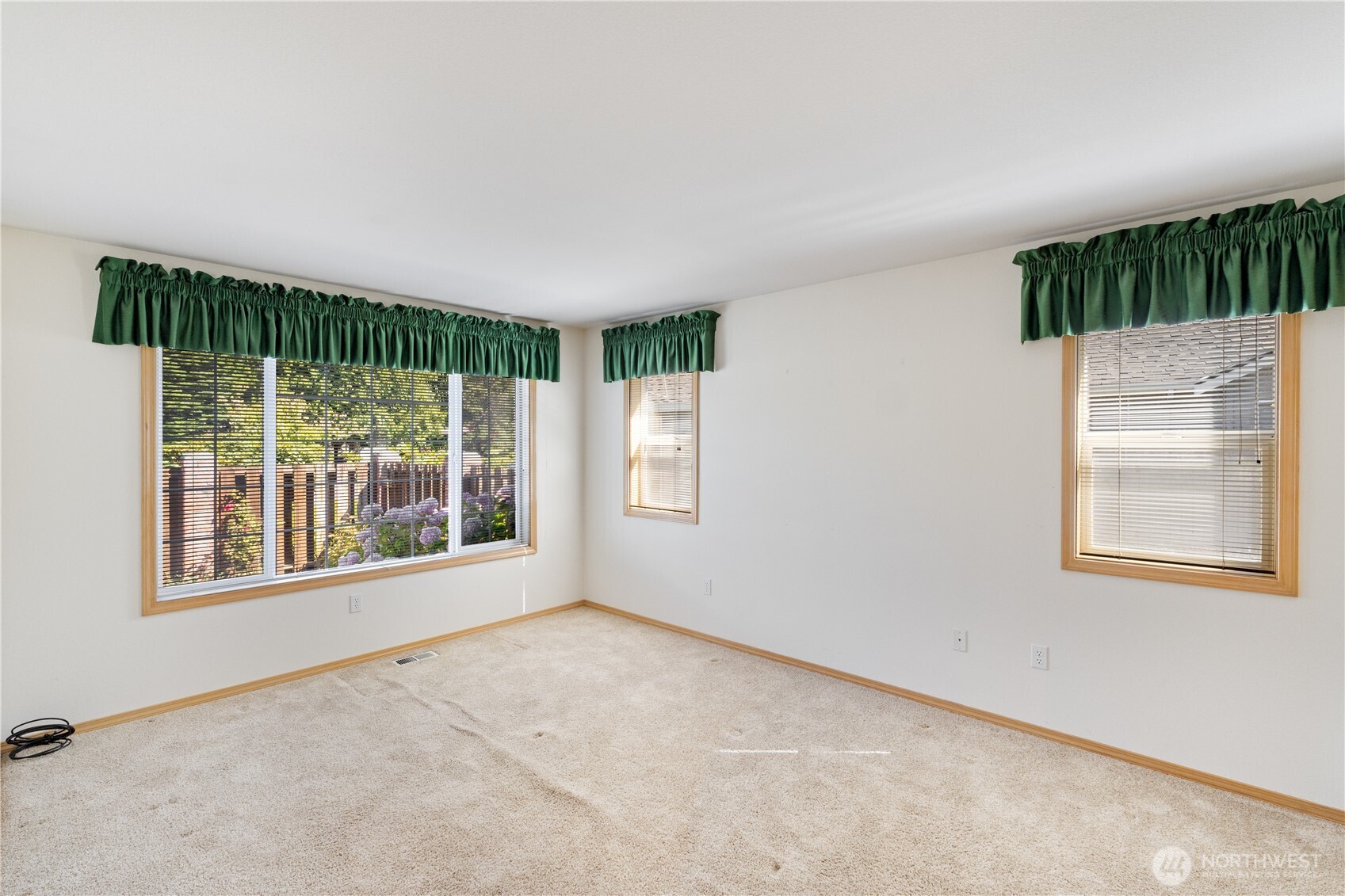 292 Foursome Drive Sequim, WA 98382 - Photo 22 of 32 an empty room with windows