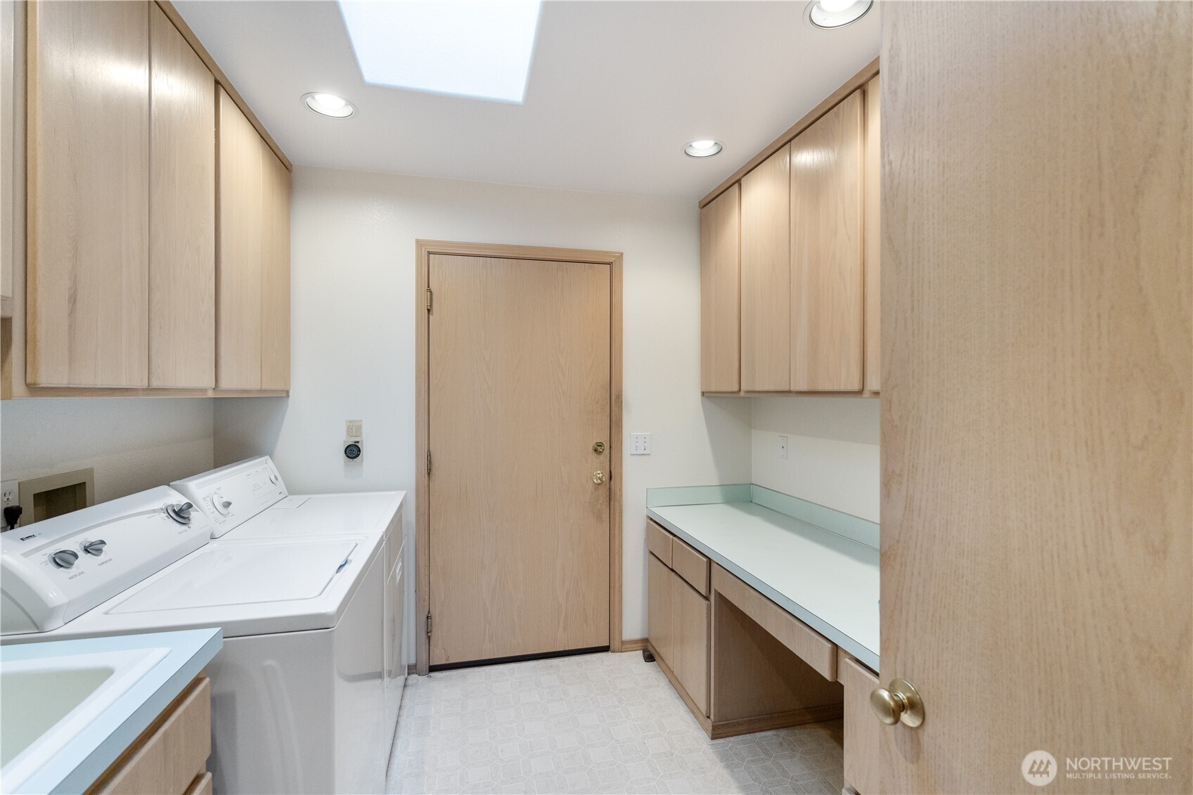292 Foursome Drive Sequim, WA 98382 - Photo 27 of 32 a storage utility room with a sink dryer and washer