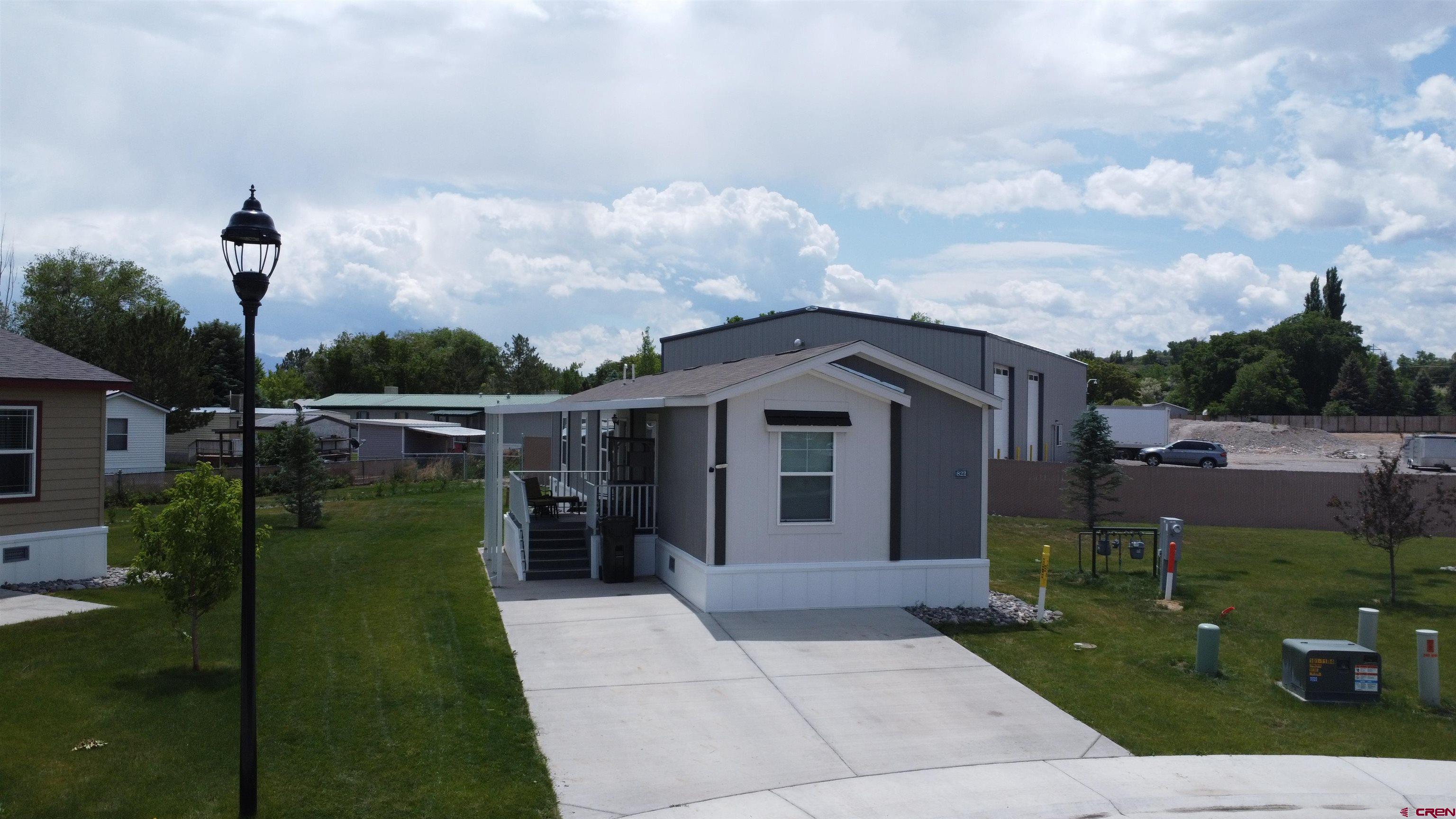 62650 Lasalle Road, Unit 822 Montrose, CO 81403 - Photo 5 of 17 a view of a garden