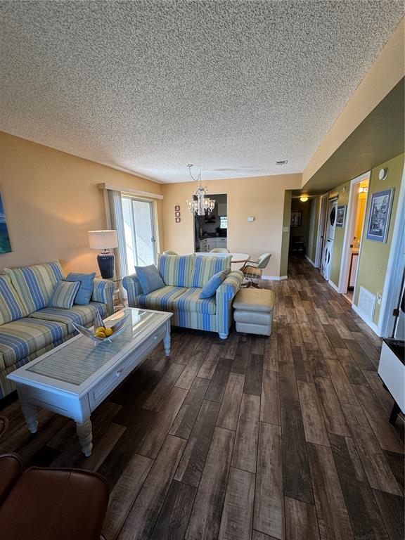 5567 Sea Forest Drive, Unit 319 New Port Richey, FL 34652 - Photo 26 of 34 a living room with furniture and a couch