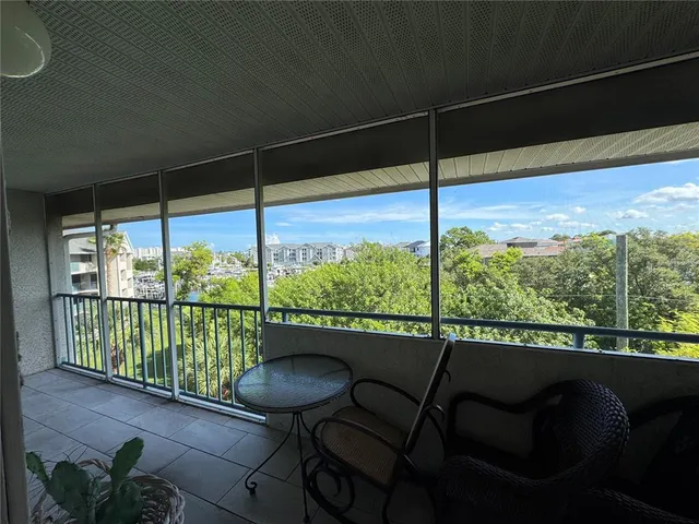 a view of a balcony with chair