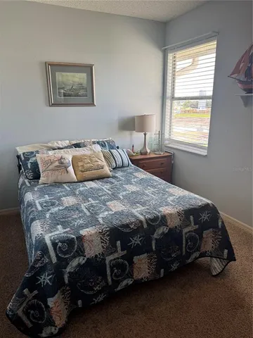 a bathroom with a double vanity sink a mirror and a shower