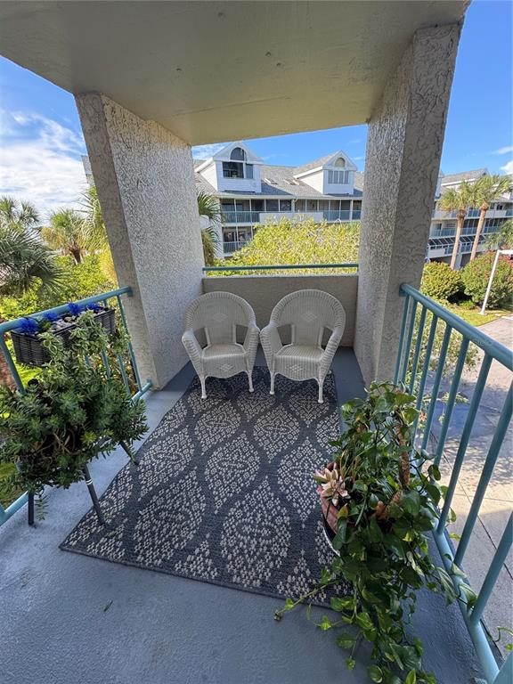 5567 Sea Forest Drive, Unit 319 New Port Richey, FL 34652 - Photo 8 of 34 a view of swimming pool with outdoor seating