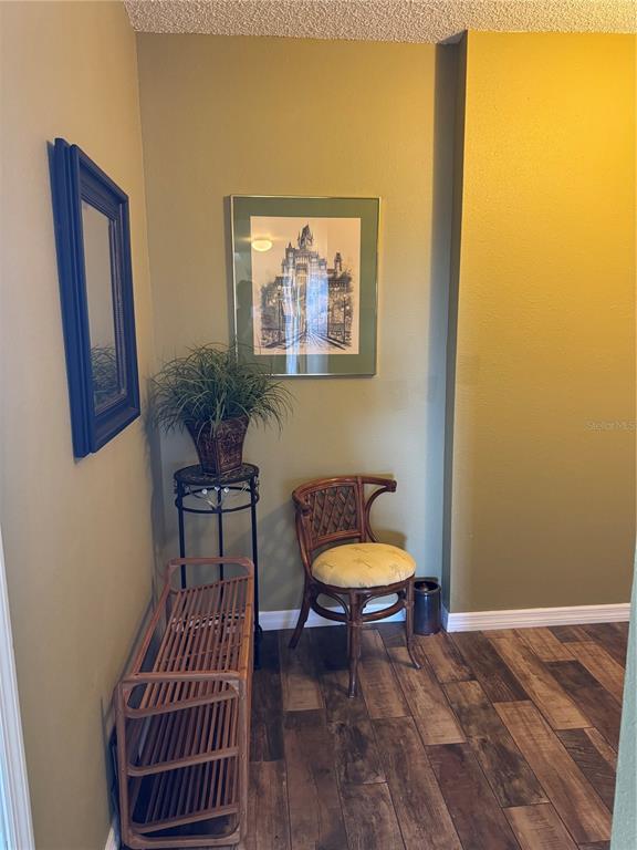 5567 Sea Forest Drive, Unit 319 New Port Richey, FL 34652 - Photo 10 of 34 a living room with furniture and a window