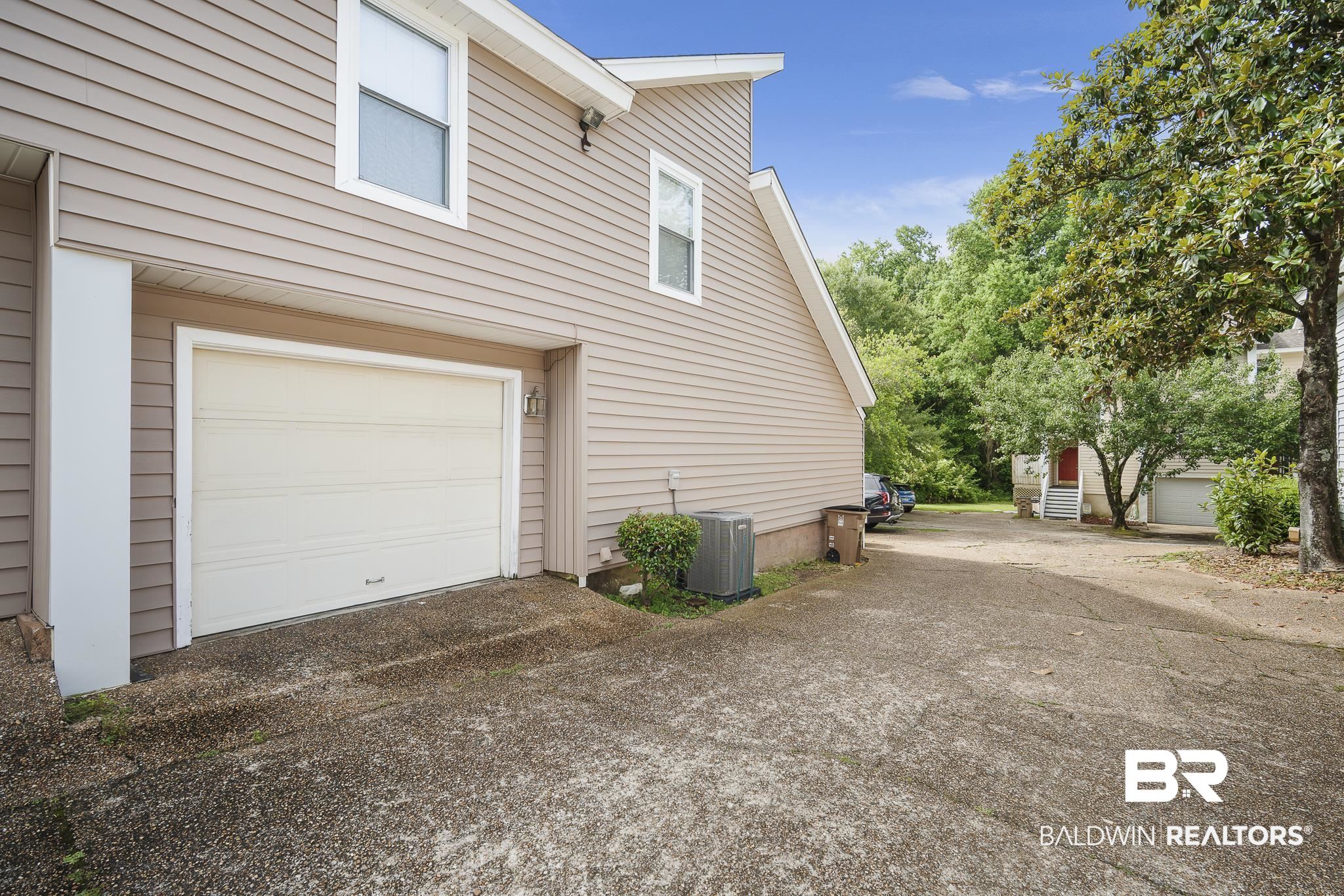6513 Cedar Bend Court, Unit B Mobile, AL 36608 - Photo 2 of 23 View of Attached Garage