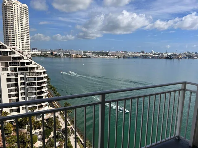 a balcony view with a lake view