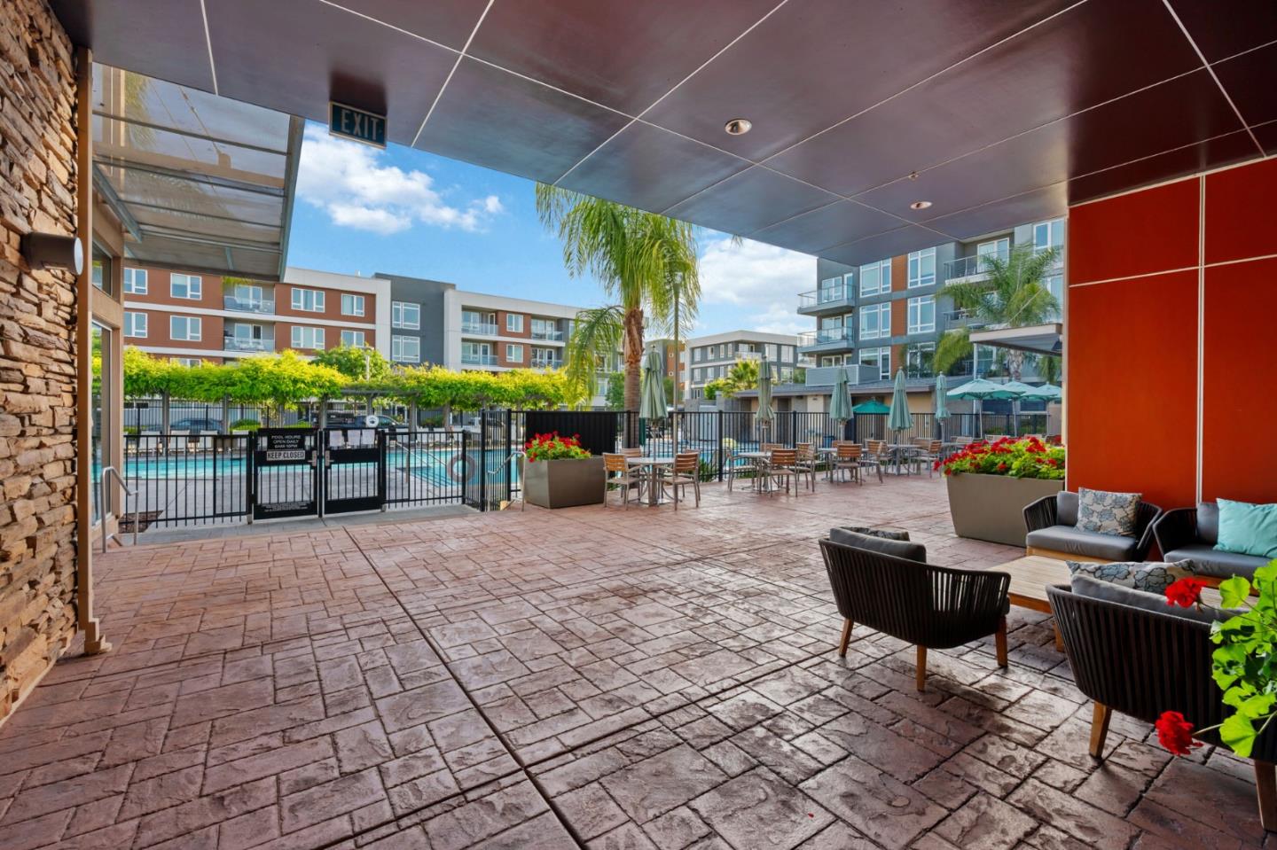 5977 Larkstone Loop San Jose, CA 95123 - Photo 51 of 63 a building outdoor space with patio furniture and potted plants