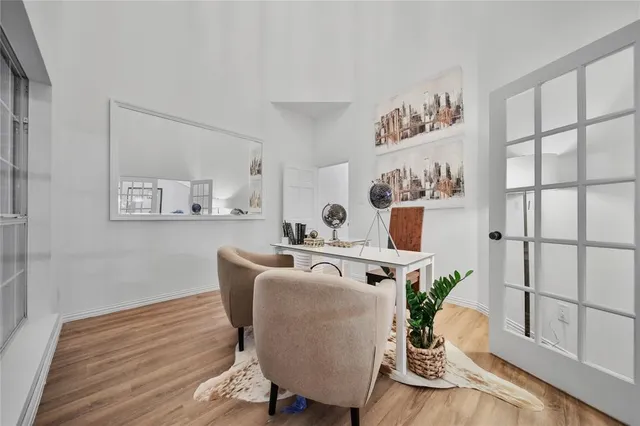 a bathroom with a double vanity sink mirror and