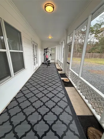 a view of wooden floor in an empty room